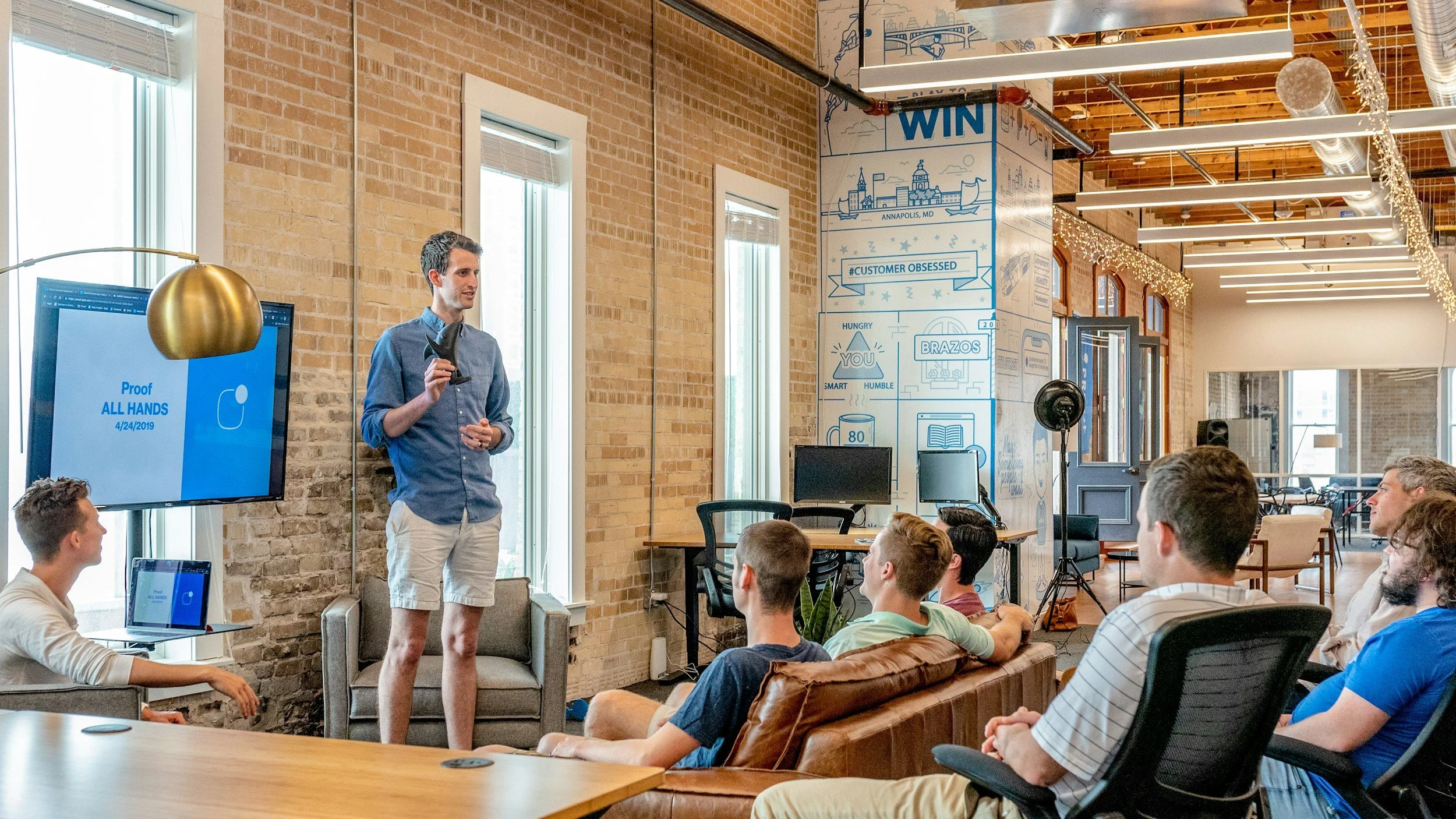 Man presenting to a group of people