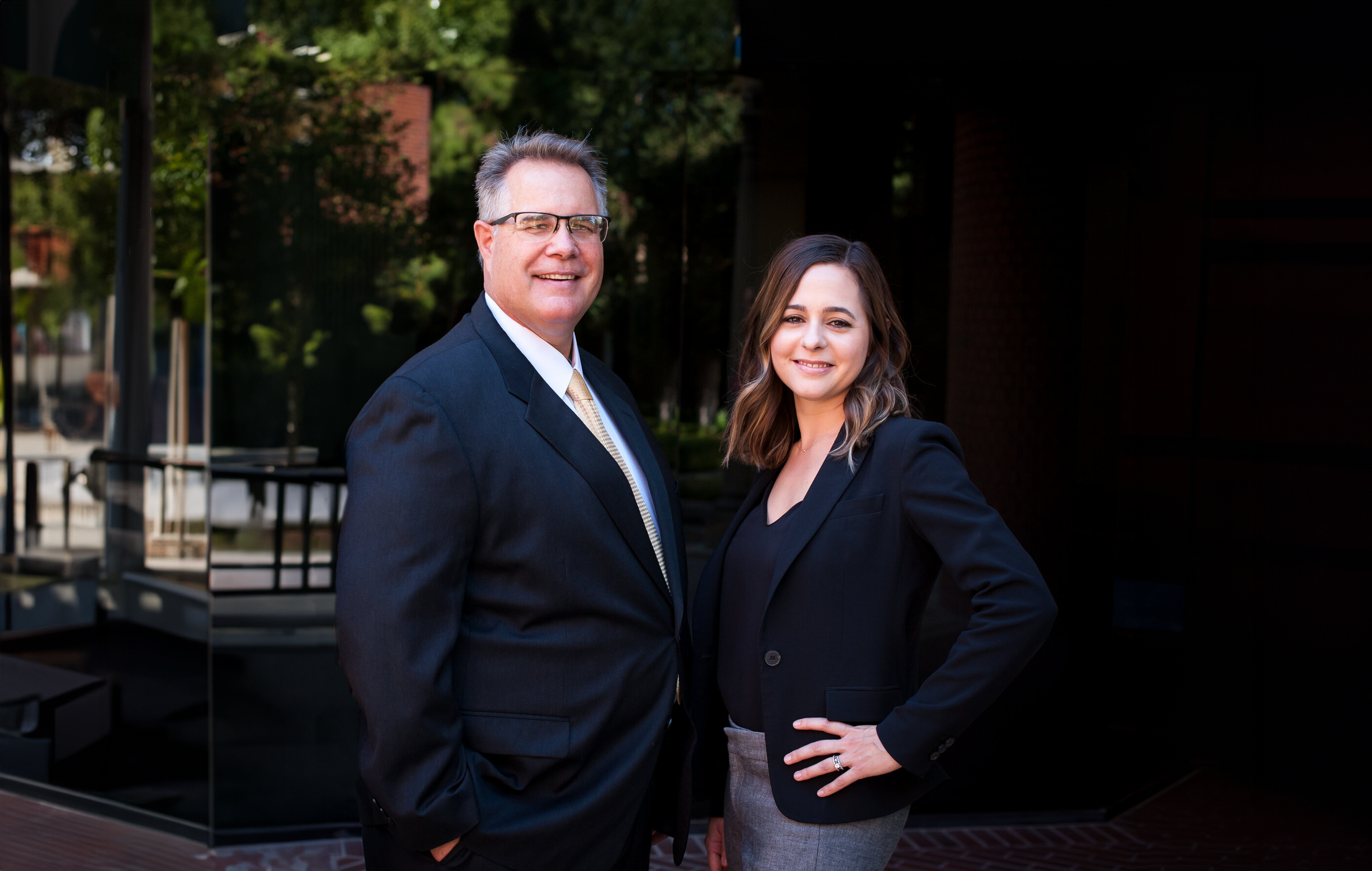 an image of Joseph O'Keefe and Rachel Mahoney smiling at the camera